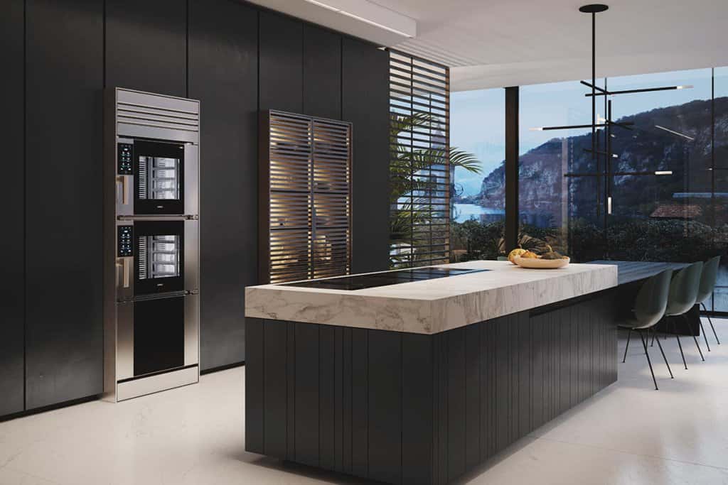 Luxury kitchen overlooking Lake Maggiore featuring Unox Casa's Model 1 wall oven